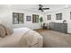 Spacious main bedroom with plush carpeting, large windows, and ample natural light at 3841 Stuart St, Denver, CO 80212