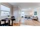 Bright living room features wood floors, natural light and calming colors at 1969 Uinta St, Denver, CO 80220