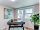 Bright office space featuring a modern desk, ample natural light, and stylish decor accents at 1969 Uinta St, Denver, CO 80220