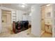 Finished basement featuring a modern washer and dryer, and a tiled standing shower bathroom at 2636 N Glencoe St, Denver, CO 80207
