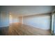 Spacious living area featuring hardwood floors and natural light at 1029 E 8Th Ave # 907, Denver, CO 80218