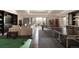Spacious game room featuring a pool table, ping pong table, and comfortable seating area at 5470 S Highline Cir, Greenwood Village, CO 80121