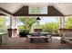 Charming outdoor patio with dining table, seating, and views of the surrounding landscape at 5470 S Highline Cir, Greenwood Village, CO 80121