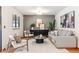 Comfortable living room featuring neutral tones, modern furniture, and an inviting space for relaxation at 5425 Camargo Rd, Littleton, CO 80123