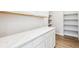 Close up of white countertops and cabinetry in kitchen with views into walk-in pantry with shelving at 2537 Lupton Ln, Lafayette, CO 80026