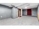 Spacious basement with neutral paint, carpeted flooring, and a furnace at 109 6Th St, Fort Lupton, CO 80621