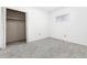 Bedroom with carpeted floors, a closet and natural light at 109 6Th St, Fort Lupton, CO 80621