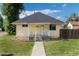 Charming single Gathering home featuring a yellow exterior and landscaped front yard at 109 6Th St, Fort Lupton, CO 80621