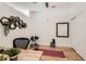 Bright home gym featuring hardwood floors, a mirror, and hexagonal wall shelves with plants at 5401 S Park Terrace Ave # 301C, Greenwood Village, CO 80111