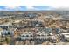 An aerial view showcasing a townhome community nestled in the city with mountain views, a great location at 2622 W 24Th Ave # 2, Denver, CO 80211