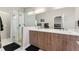 Modern bathroom featuring a double vanity, a glass shower, and clean, modern finishes at 2622 W 24Th Ave # 2, Denver, CO 80211