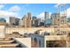 Expansive city view from the rooftop showing the skyline against a bright blue sky at 2622 W 24Th Ave # 2, Denver, CO 80211