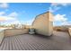 Spacious rooftop deck offers ample room for outdoor seating and city views, ideal for enjoying warm evenings at 2622 W 24Th Ave # 2, Denver, CO 80211