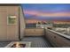 Relaxing rooftop deck with cozy gas fire pit and a panoramic view of the city skyline at 2622 W 24Th Ave # 2, Denver, CO 80211