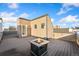 Inviting rooftop deck featuring stylish stone fire pit, perfect for entertaining or relaxing under the open sky at 2622 W 24Th Ave # 2, Denver, CO 80211