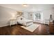 Cozy bedroom with hardwood floors, natural light, and a comfortable queen-sized bed at 36412 Paradise Cir, Elizabeth, CO 80107
