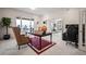 Spacious home office with large windows offering scenic views, and a comfortable work environment at 36412 Paradise Cir, Elizabeth, CO 80107