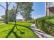 Landscaped backyard with a view of a lake at 4333 S Andes Way # 204, Aurora, CO 80015