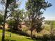 Community tennis court and water views from backyard at 4333 S Andes Way # 204, Aurora, CO 80015