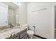 Simple bathroom with granite countertop and shower at 4333 S Andes Way # 204, Aurora, CO 80015