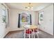 Bright dining room with a table and four chairs at 4333 S Andes Way # 204, Aurora, CO 80015