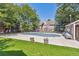 Community swimming pool with lounge chairs at 4333 S Andes Way # 204, Aurora, CO 80015