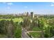 Stunning aerial view of the Denver skyline and Cheeseman Park at 1489 Steele St # 104, Denver, CO 80206