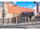 The Fillmore Auditorium brick building, showcasing its architectural details and marquee, an entertainment landmark at 1489 Steele St # 104, Denver, CO 80206