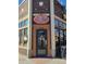 Exterior shot of Goosetown Tavern, showcasing its signage, brick facade, and inviting entrance with door number 3242 at 1489 Steele St # 104, Denver, CO 80206