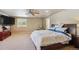 Inviting primary bedroom featuring a ceiling fan and plenty of natural light at 5755 S Fulton Way, Greenwood Village, CO 80111