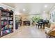 Spacious living room with hardwood floors that connects to dining and lounge spaces at 5755 S Fulton Way, Greenwood Village, CO 80111