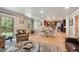 Spacious living room and dining area with hardwood floors and backyard access at 5755 S Fulton Way, Greenwood Village, CO 80111