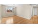 Dining room featuring hardwood floors and natural light, perfect for hosting gatherings at 1662 S Everett St, Lakewood, CO 80232