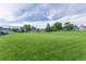 Expansive community green space featuring open green space and community housing at 13393 E Louisiana Ave, Aurora, CO 80012