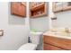 This bathroom features a toilet, vanity, and sink at 11599 Kendall St, Westminster, CO 80020