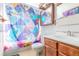 This bathroom features a shower and tub combo with a vanity and sink at 11599 Kendall St, Westminster, CO 80020