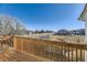 Relaxing deck with wooden railing and neighborhood views at 1100 S Waco St # D, Aurora, CO 80017