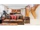 Finished basement boasts a comfortable seating area, wet bar, and a staircase at 1143 S Saint Paul St, Denver, CO 80210