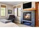 A warm main bedroom with a fireplace, natural light, and cozy decor at 1143 S Saint Paul St, Denver, CO 80210