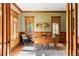 Inviting home office with wood-trimmed windows, natural light, and traditional design at 1143 S Saint Paul St, Denver, CO 80210
