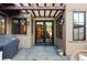 Outdoor patio with stone pavers, a covered pergola, and well-placed lighting at 1143 S Saint Paul St, Denver, CO 80210