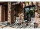 Cozy outdoor patio with chairs and a small table, perfect for enjoying the tranquil surroundings at 1143 S Saint Paul St, Denver, CO 80210