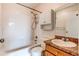 Bathroom with white tile in the shower-tub combo at 55490 E 27Th Pl, Strasburg, CO 80136