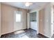 This room includes a washer and dryer hookup, exterior access and ceiling fan at 55490 E 27Th Pl, Strasburg, CO 80136