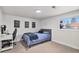 Bedroom with natural light and a comfortable bed at 5121 W Plymouth Dr, Littleton, CO 80128