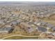 Aerial view of a residential neighborhood with houses, roads, and green spaces at 4280 Crystal Dr, Broomfield, CO 80023