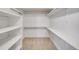 Large walk-in closet with built-in shelving at 4280 Crystal Dr, Broomfield, CO 80023