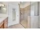 Walk-in shower with tiled walls and flooring at 4280 Crystal Dr, Broomfield, CO 80023