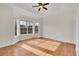 Sunny bedroom with hardwood floors and bay window at 4280 Crystal Dr, Broomfield, CO 80023