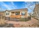 Ranch-style home with a covered patio and landscaped yard at 4280 Crystal Dr, Broomfield, CO 80023